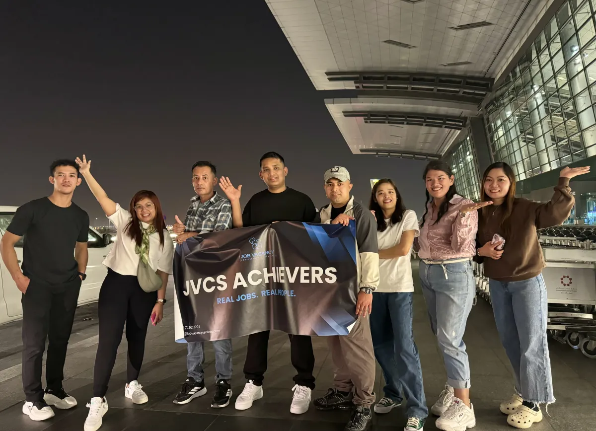 JVCS achievers arriving at Qatar airport for their new roles